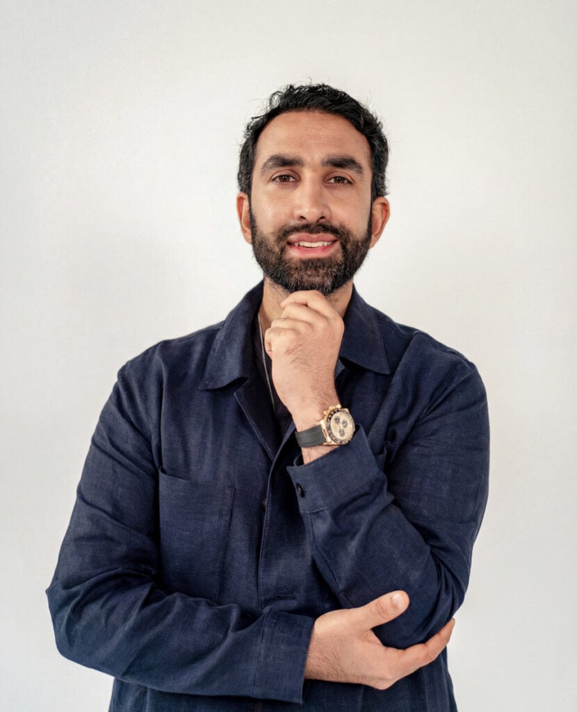 Manick Bhan, branding expert, showcasing his professional brand kit for business branding.