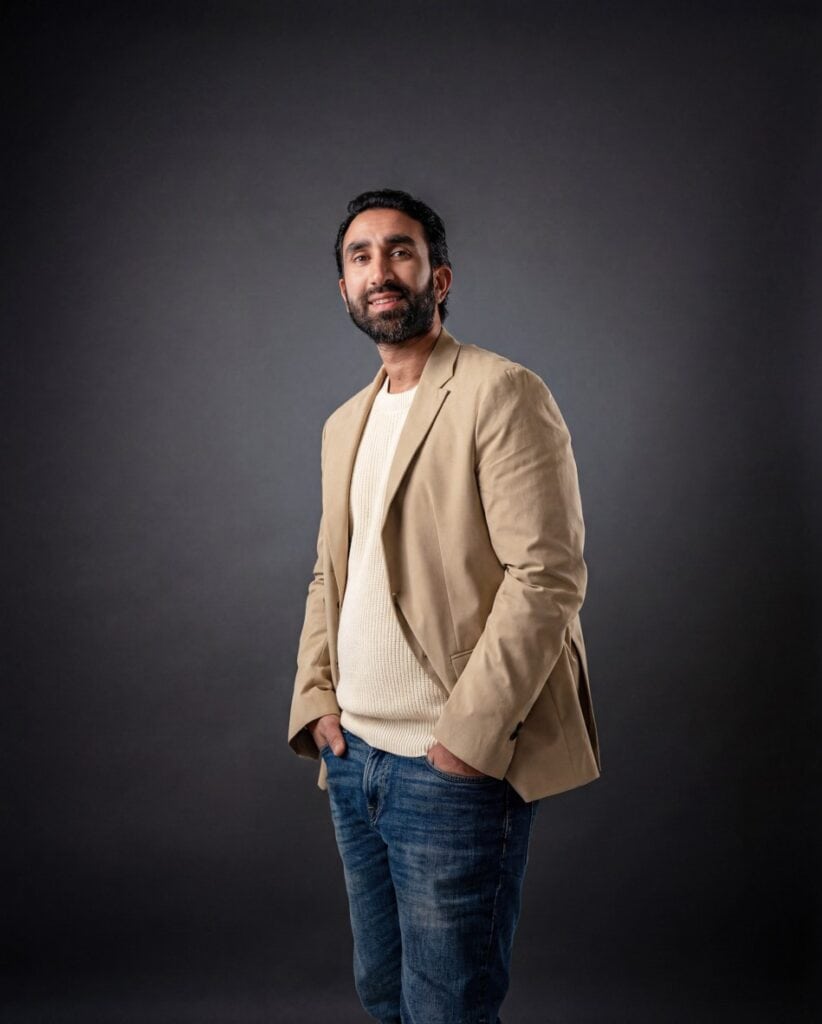 Manick Bhan, branding expert, in professional portrait for Brand Kit.