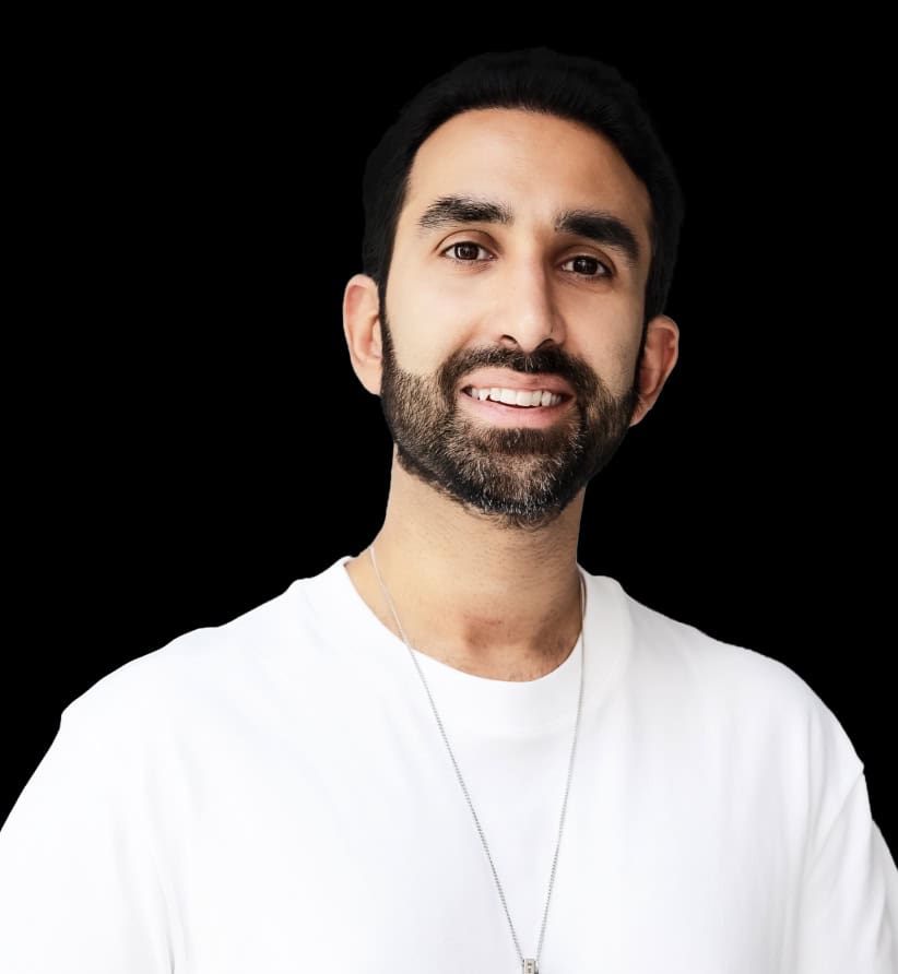 Manick Bhan speaking at a professional event on leadership and innovation.