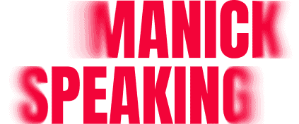 Manick Bhan speaking at a conference on leadership and innovation.