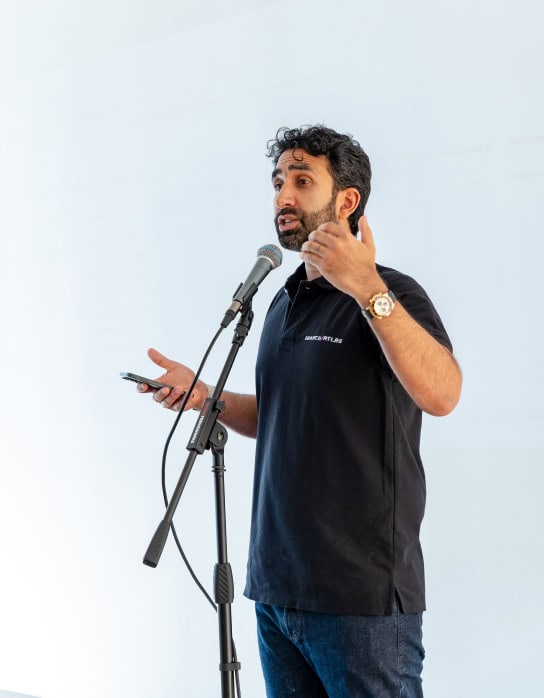 Manick Bhan speaker presenting at a professional event.